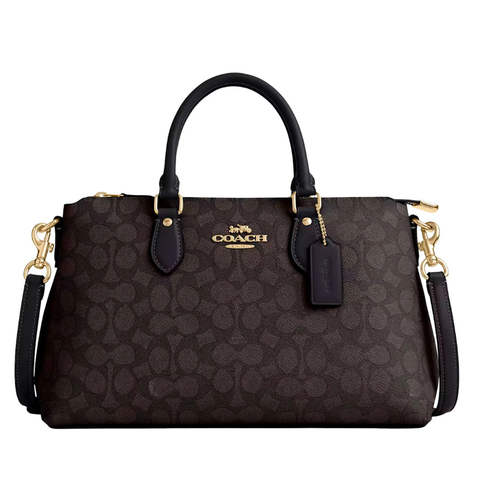 Bolso Coach café, estampado y straps ne...